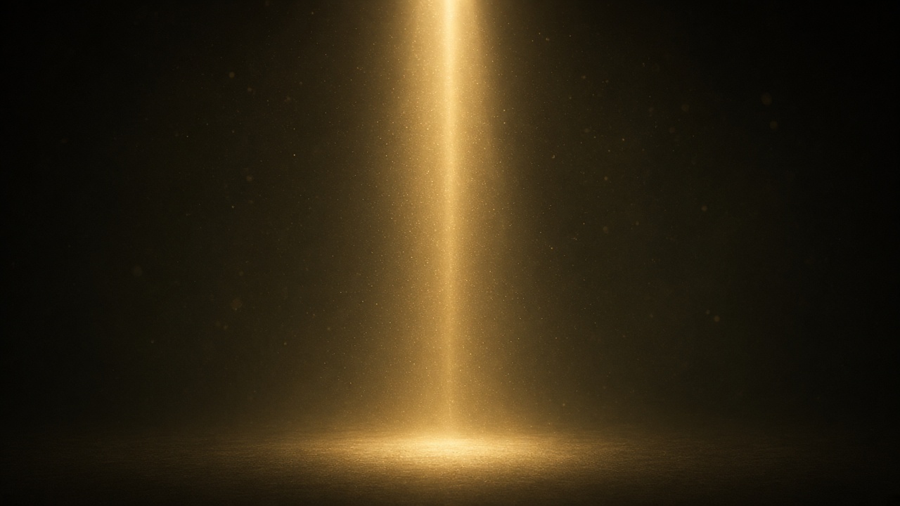 A vertical shaft of gold light with a soft triangular glow